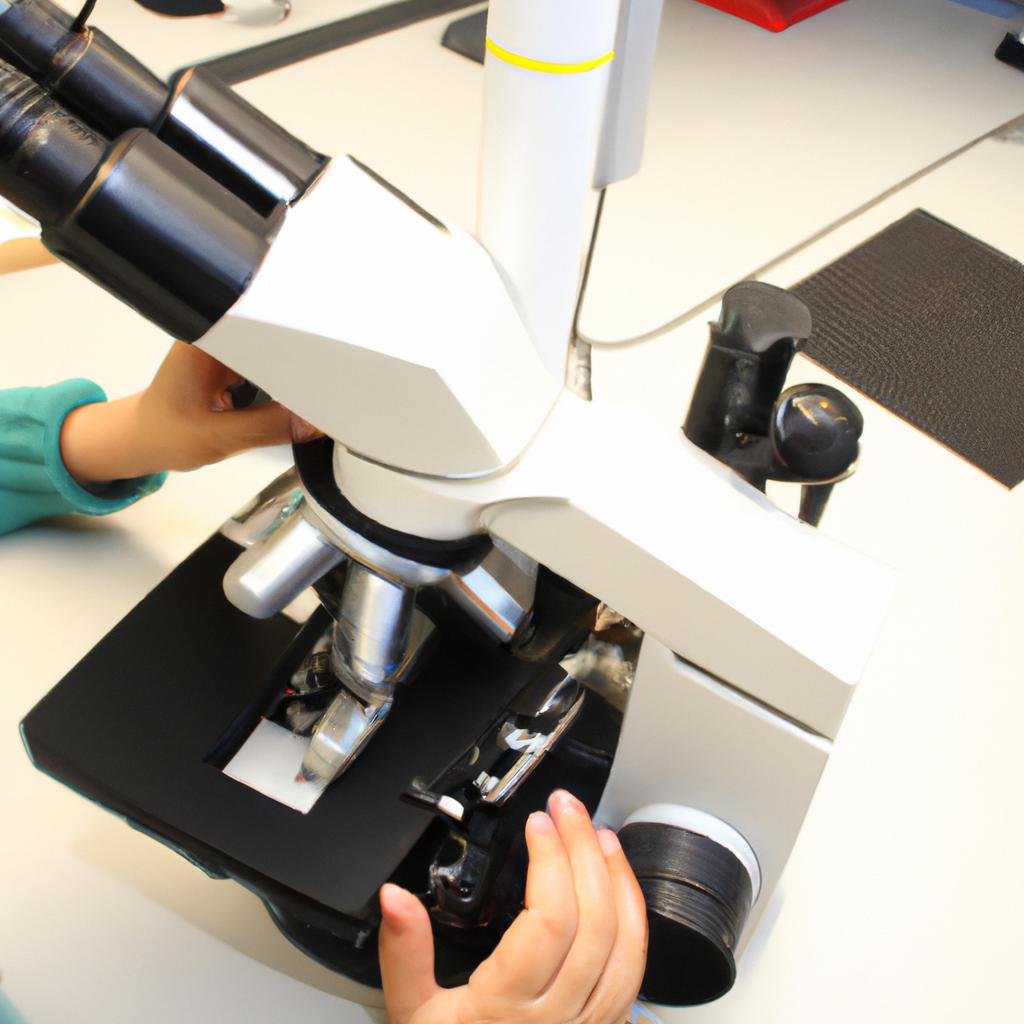 Person using microscope in lab
